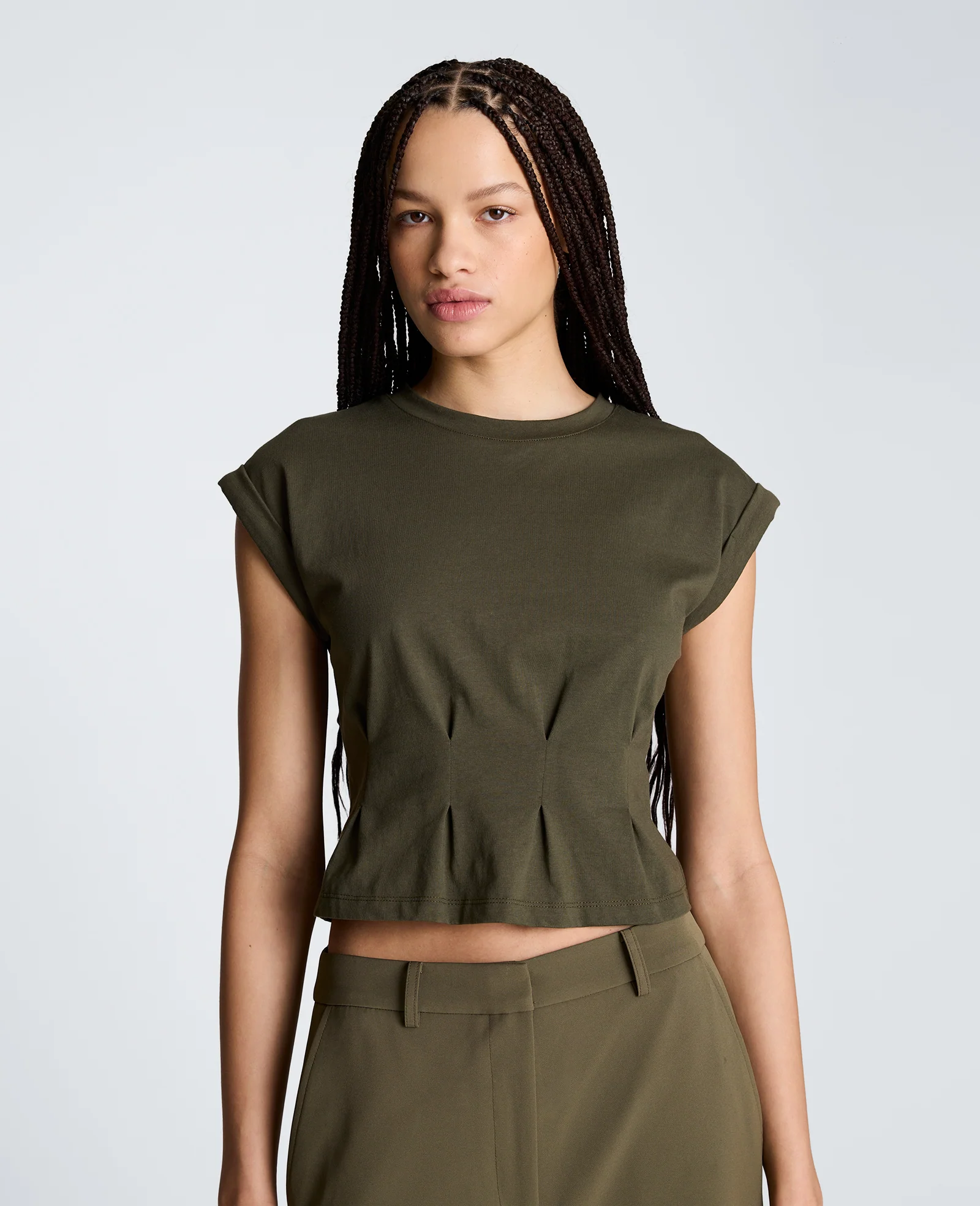 Extended Shoulder Top With Peplum Waist